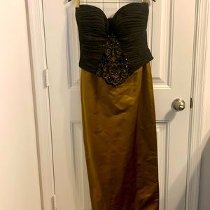 size 6 black tie/formal black and gold evening dress by Sam Carlos.